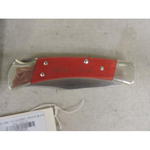 BUCK USA 110 SIGNED CHUCK BUCK CHAIRMAN SERIES CHERRY WOOD HANDLES KNIFE W/ LEATHER SHEATH