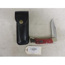 BUCK USA 110 SIGNED CHUCK BUCK CHAIRMAN SERIES CHERRY WOOD HANDLES KNIFE W/ LEATHER SHEATH