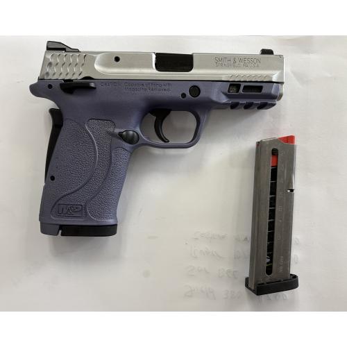 Pre-owned M&P380 Shield EZ .380 ACP handgun, picatinny-style rail, a 3.7" barrel, a stainless slide, purple frame, and two 8-round magazine.