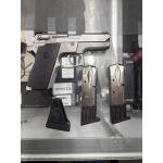 Pre Owned Smith & Wesson Model 669 and 3 Magazines and Speedloader