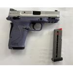 Pre-owned M&P380 Shield EZ .380 ACP handgun, picatinny-style rail, a 3.7" barrel, a stainless slide, purple frame, and two 8-round magazine.