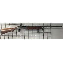 USED REMINGTON 1100 WITH CASE.