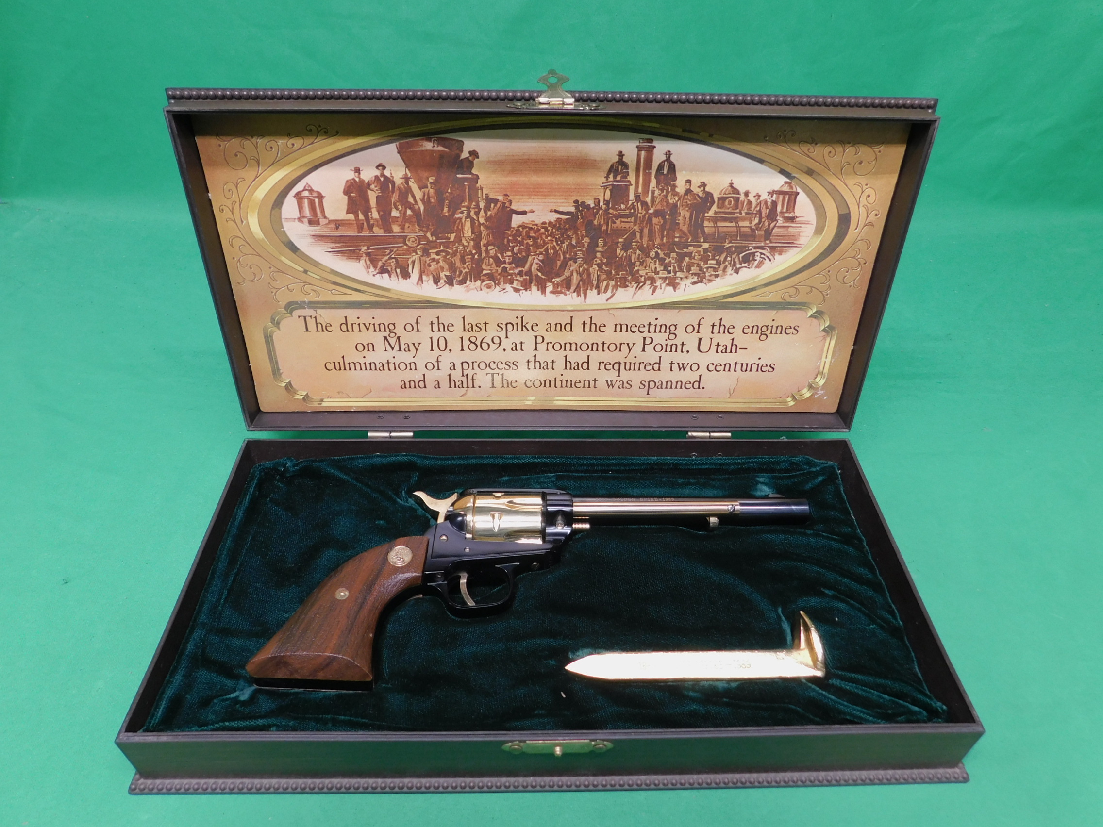 USED 1969 COLT FRONTIER SCOUT GOLDEN SPIKE .22LR 6" REVOLVER. BLACK AND GOL-img-0
