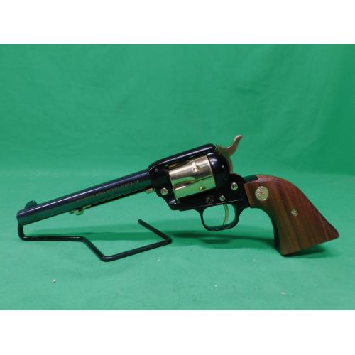 USED 1969 COLT FRONTIER SCOUT GOLDEN SPIKE .22LR 6" REVOLVER. BLACK AND GOLD AS ISSUED IN DISPLAY CASE W/SPIKE PAPERWORK. 98% ESTATE COLLECTION (Consignment)