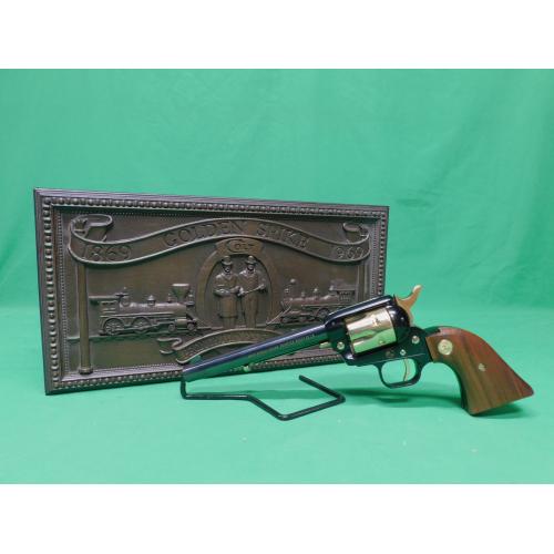 USED 1969 COLT FRONTIER SCOUT GOLDEN SPIKE .22LR 6" REVOLVER. BLACK AND GOLD AS ISSUED IN DISPLAY CASE W/SPIKE PAPERWORK. 98% ESTATE COLLECTION (Consignment)