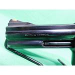 USED SMITH & WESSON 586-2 .357 MAG 4" 6RD BLUED DOUBLE ACTION REVOLVER. W/PACHMAYR GRIPS. LIGHT BLUING LOSS AT END OF BARREL. GOOD USED 95%