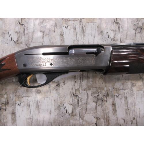 REMINGTON 1100 PREMIER SPORTING SEMI-AUTO SILVER RECEIVER W/ GOLD INLAY DELUXE WALNUT STOCK 28" BBL 12GA W/ FACTORY BOX & LUGGAGE CASE
