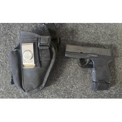 PRE-OWNED SIG SAUER P290RS 9MM 1X8RD MAG AND HOLSTER