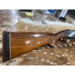 Remington 870 Wingmaster Magnum 12 ga pump shotgun with a 24