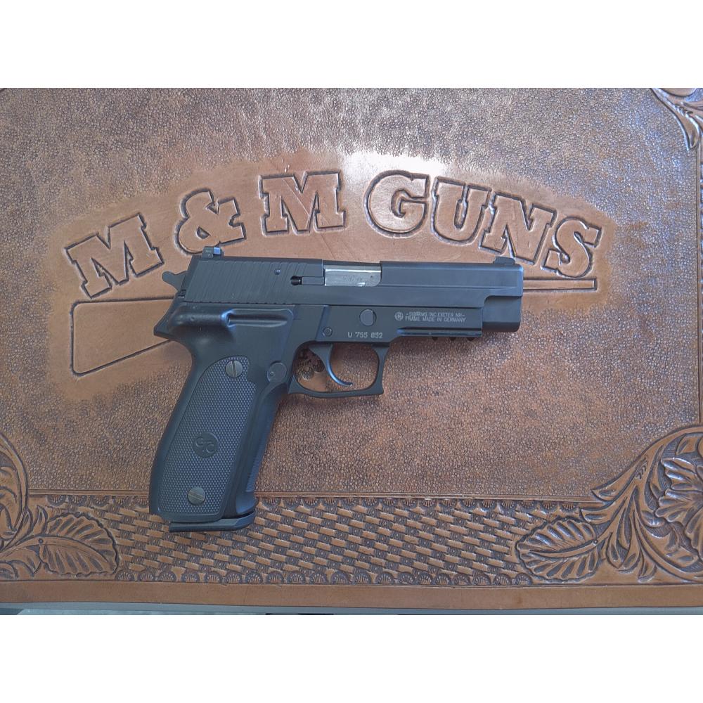 Pre-Owned Sig Sauer P226 with Crimson Trace Grips and original box. (Consignment)