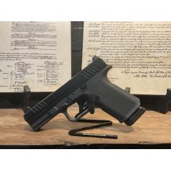 Used Ruger RXM with magpul gray grip, comes with two 15 round magazines and a hard case.