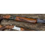 Spandau Target 32" Over Under w adjust comb and hard case & interchangeable chokes.