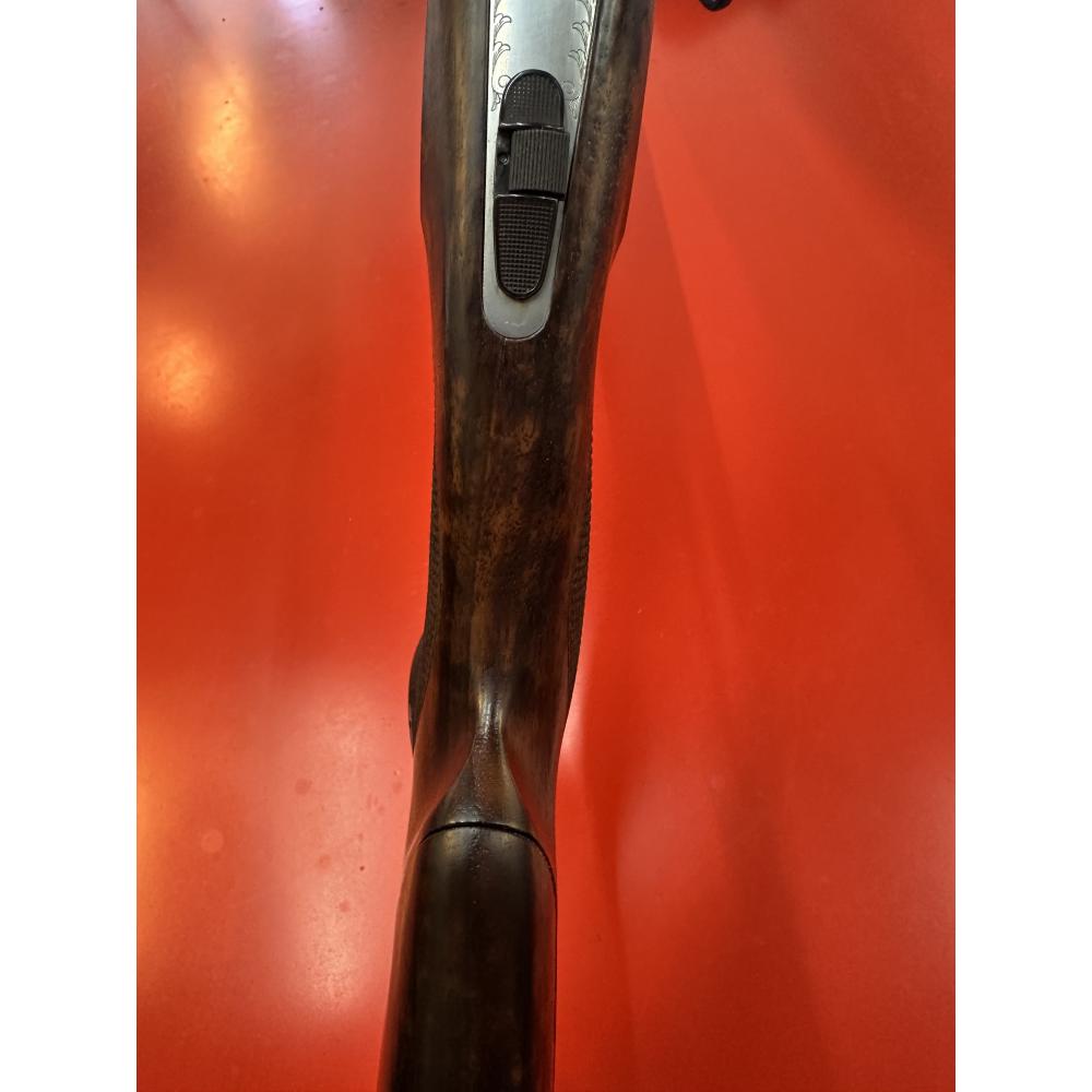 F.A.I.R Carrera IV - Nickel receiver with black script, FX wood with adjustable comb, ventilated midrib and buttplate, black lever and hinge pins, ported barrels, ABS case