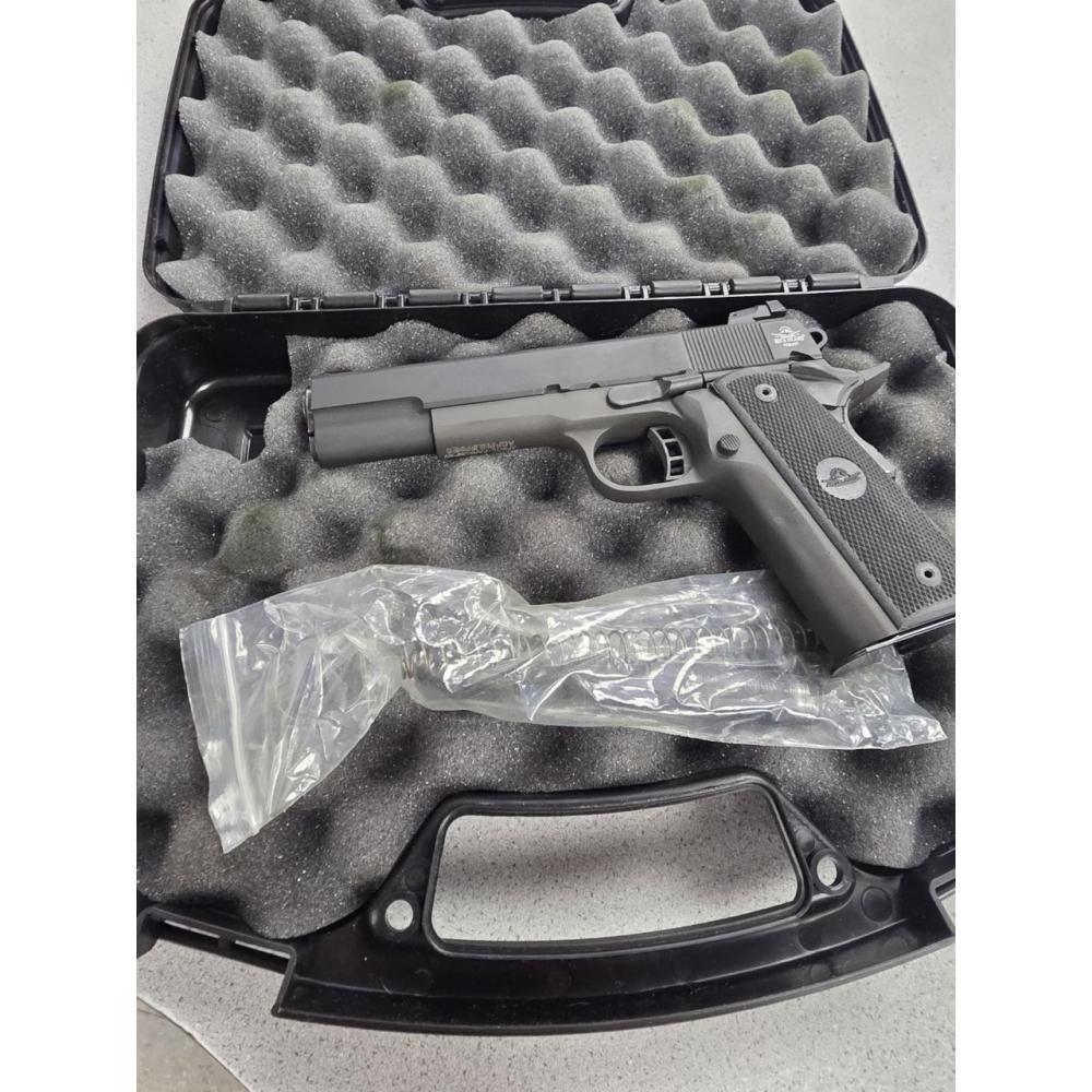 ROCK ISLAND M1911 A2 IN 22TCM/9MM.  GOOD CONDITION.  COMES IN ORIGINAL BOX AND 1 MAG.