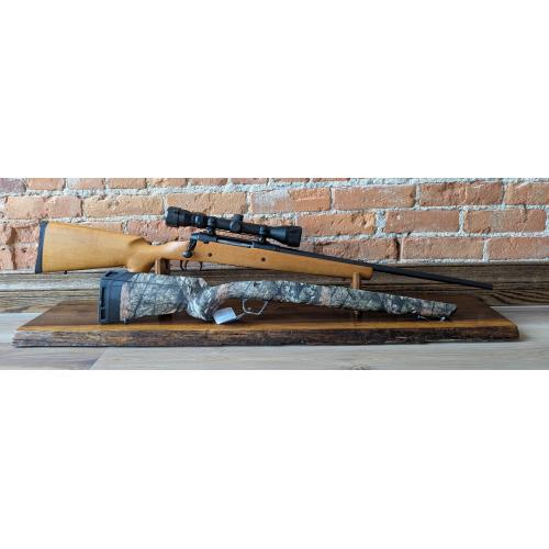 With extra stock and Weaver Scope