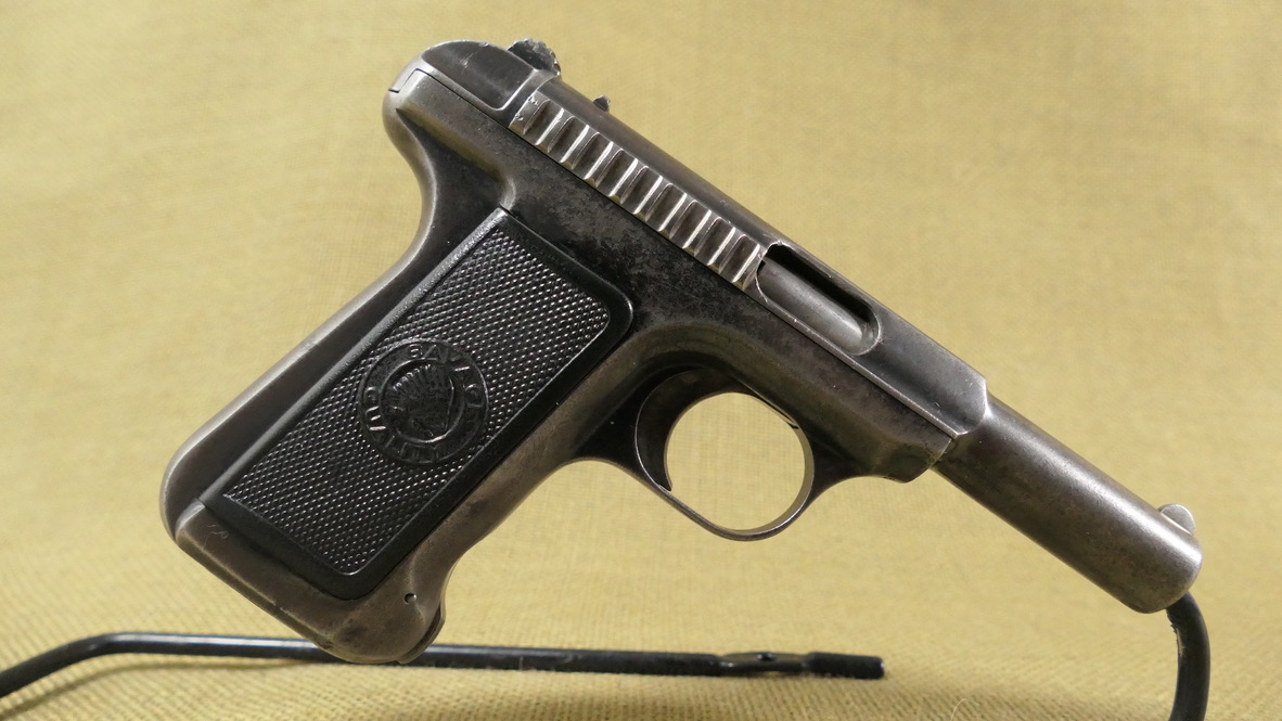 Savage .32 ACP with Indian head grips