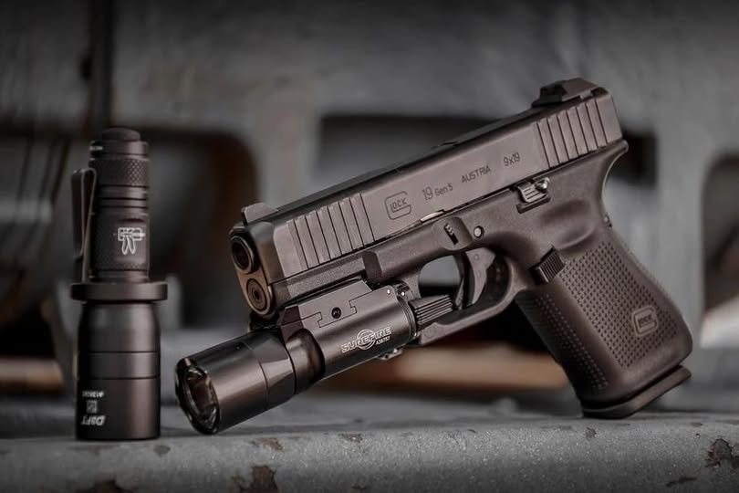 SureFire M640DFT Turbo Scout Light Pro on a rifle, side view