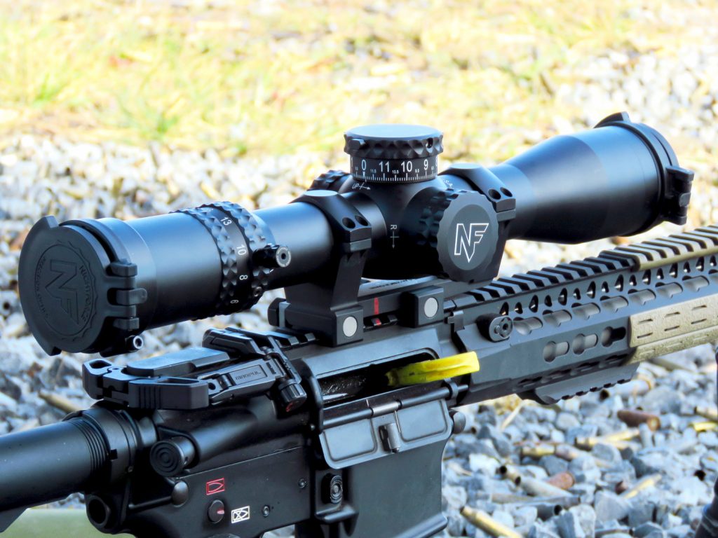 Precision rifle with high-end scope mounted in a one-piece mount